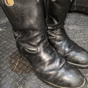 Leather steel toe slip on boots.